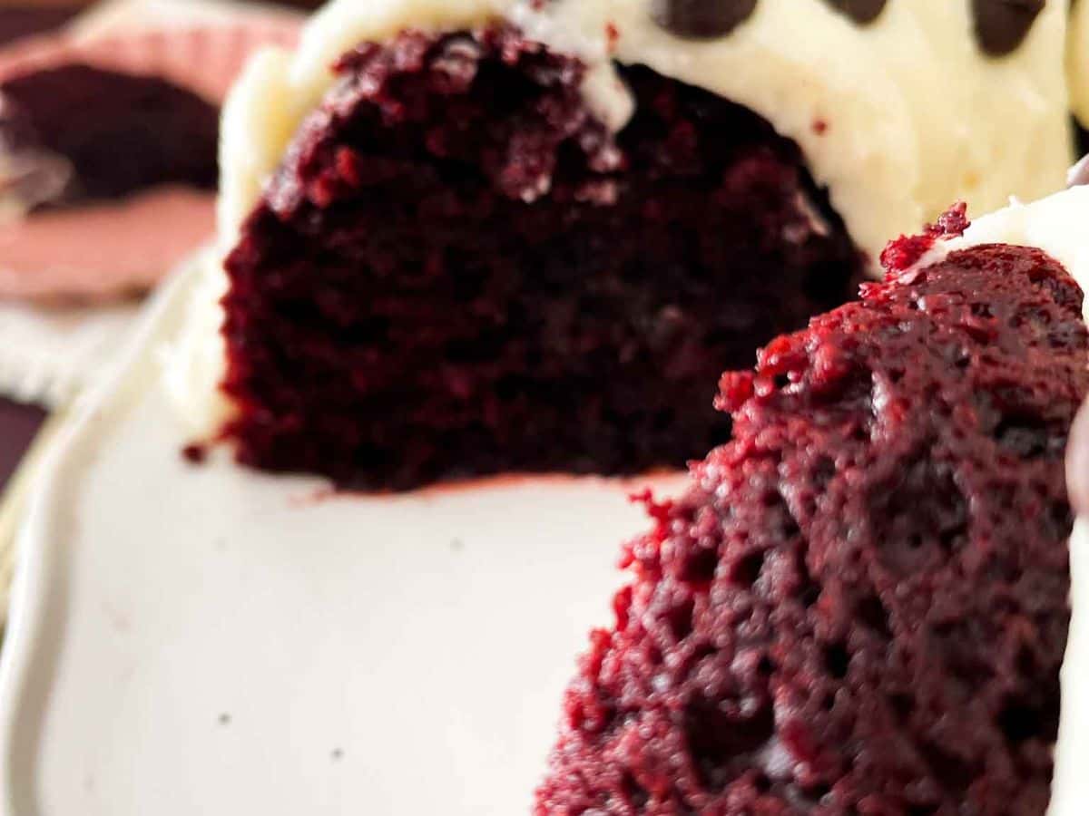 red velvet bundt cake with slices cut