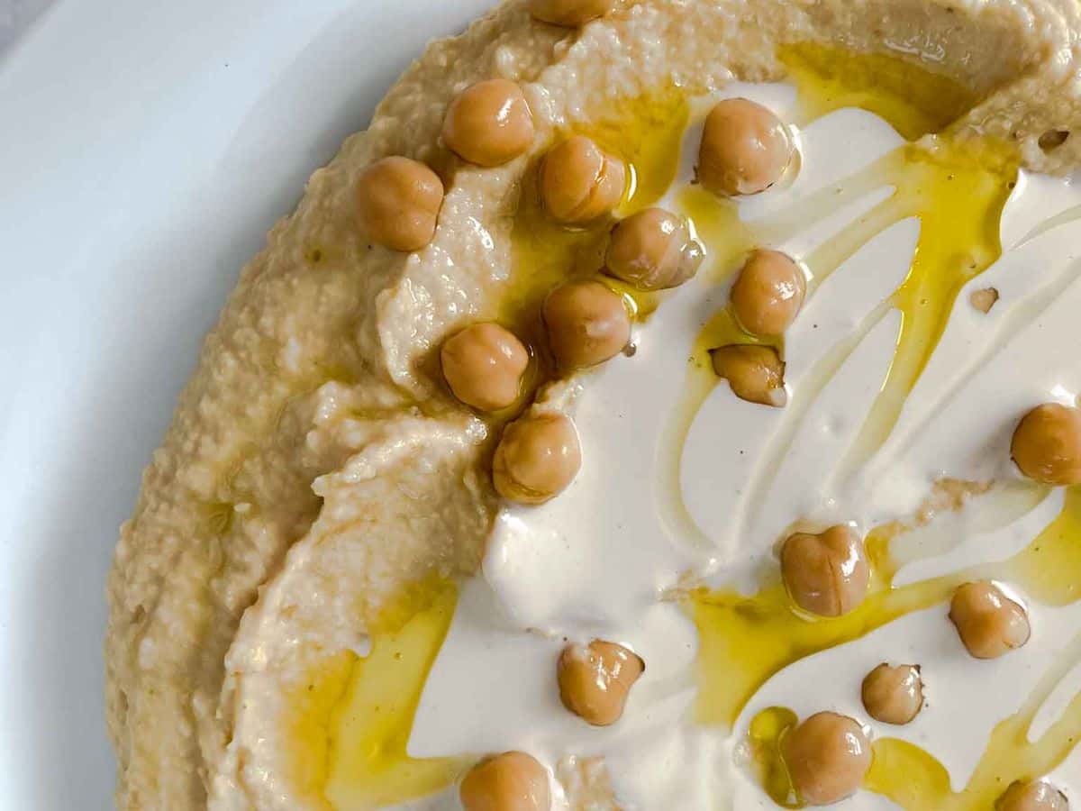 closeup of homemade hummus with tahini sauce