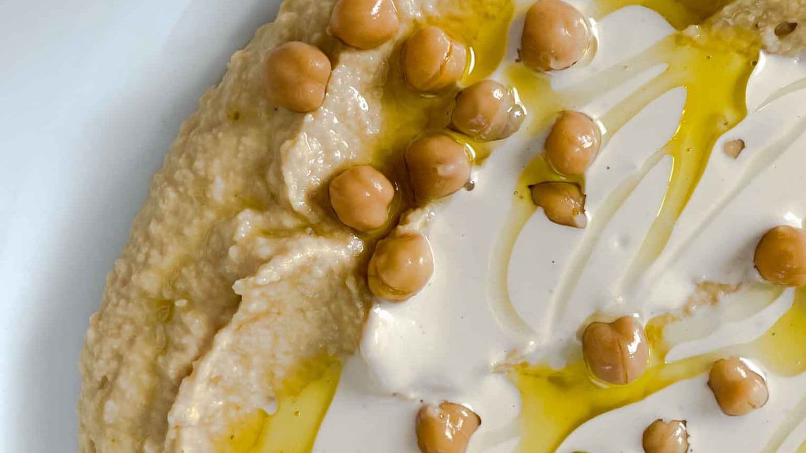 closeup of homemade hummus with tahini sauce