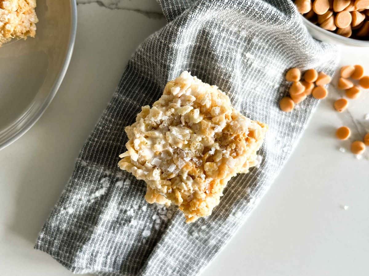overhead shot of salted butterscotch rice krispies with butterscotch chips