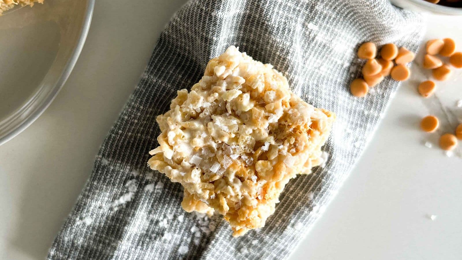 overhead shot of salted butterscotch rice krispies with butterscotch chips
