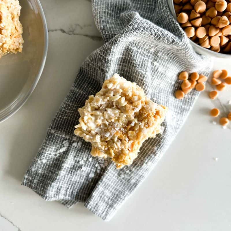 overhead shot of salted butterscotch rice krispies with butterscotch chips