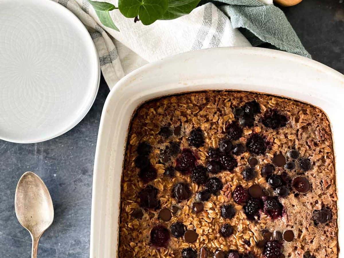 baked oatmeal with berries in casserole dish