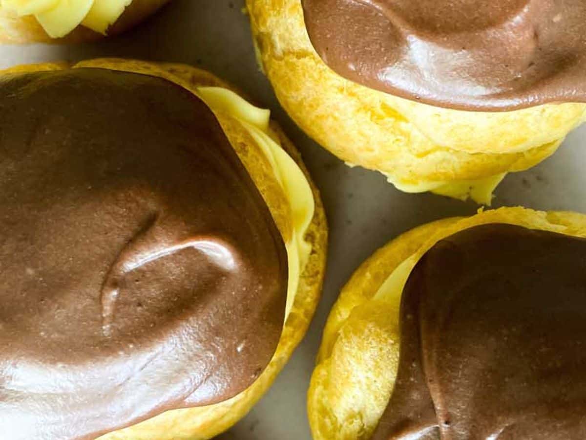 overhead view of several chocolate eclairs