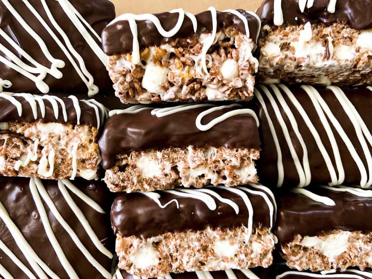 chocolate peanut butter rice krispie treats stacked in a pattern showing top and sides