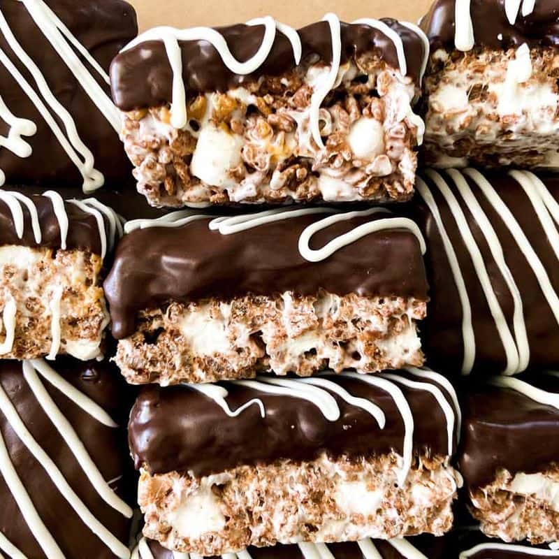 chocolate peanut butter rice krispie treats stacked in a pattern showing top and sides