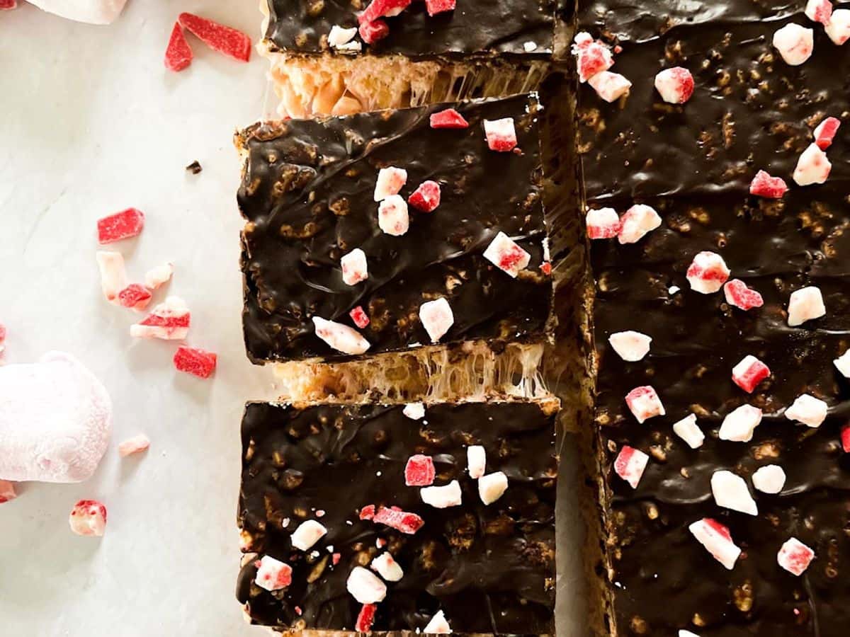 dark chocolate rice krispie treats cut and pulling apart