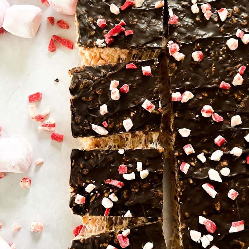 dark chocolate rice krispie treats cut and pulling apart