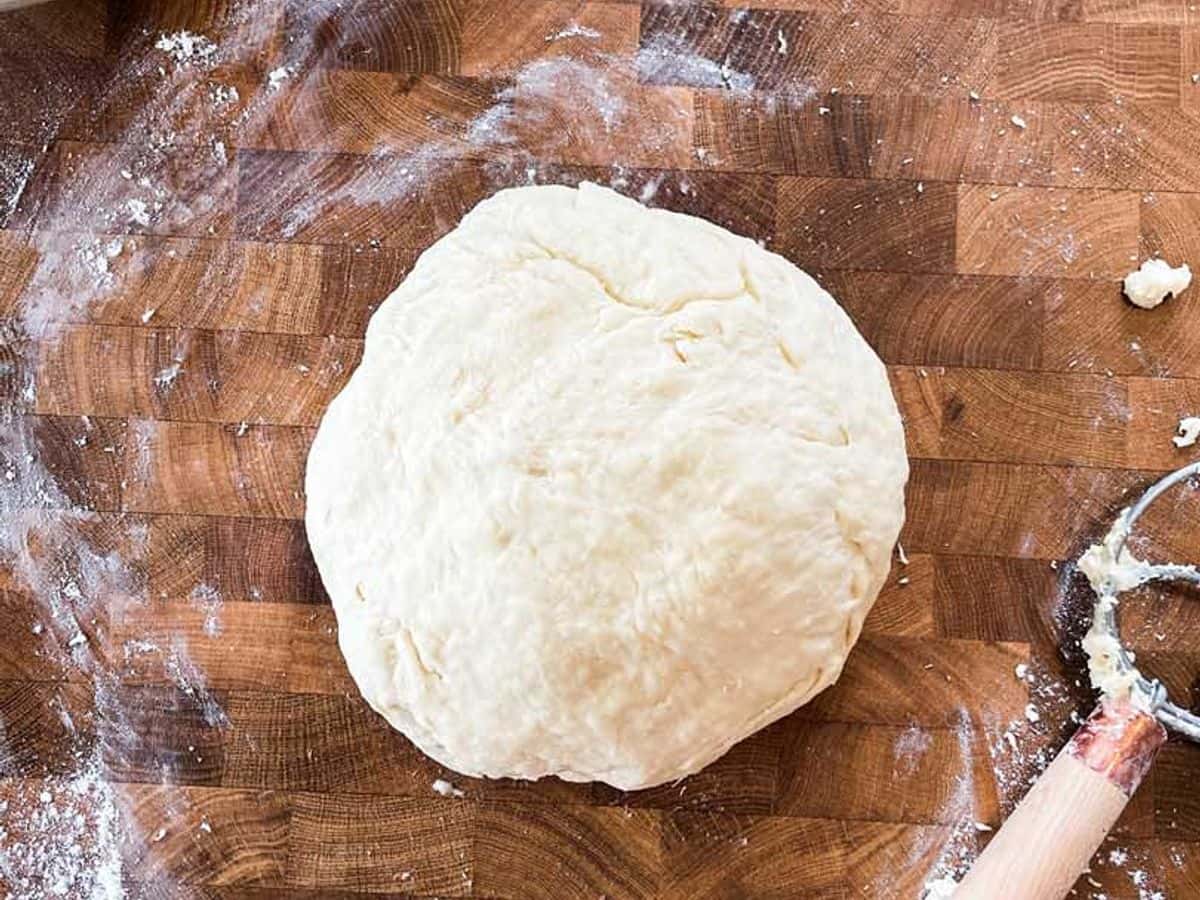 ball of dough on counter for making lion house dinner rolls