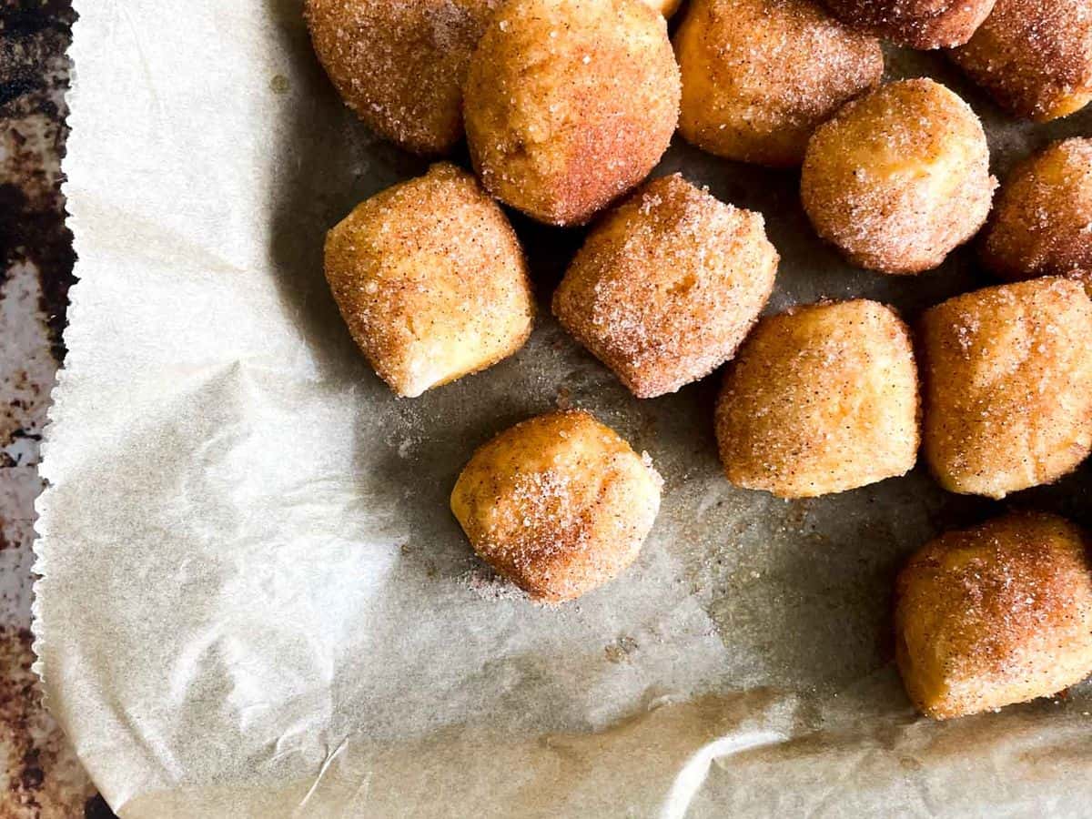 pan of pumpkin pretzel bites coated in cinnamon sugar