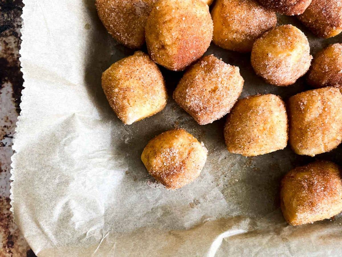 pan of pumpkin pretzel bites coated in cinnamon sugar