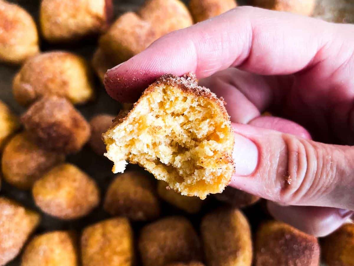 pumpkin pretzel bite with a bite taken out of it
