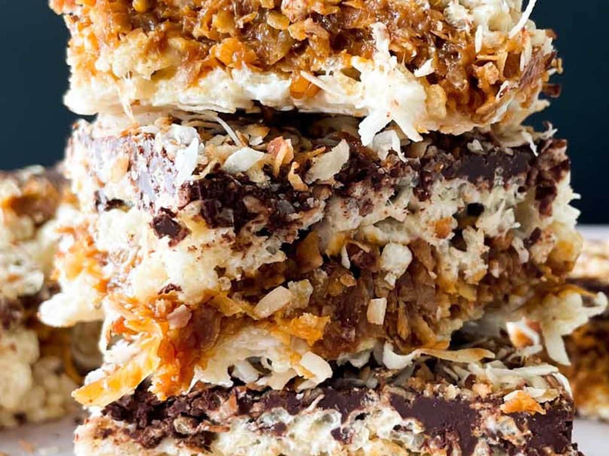 stack of samoa rice krispy treats with flakes of toasted coconut