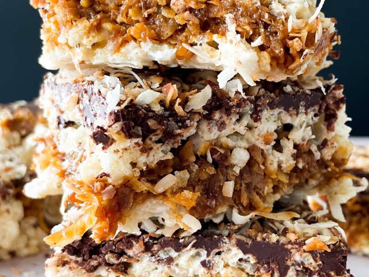 stack of samoa rice krispy treats with flakes of toasted coconut