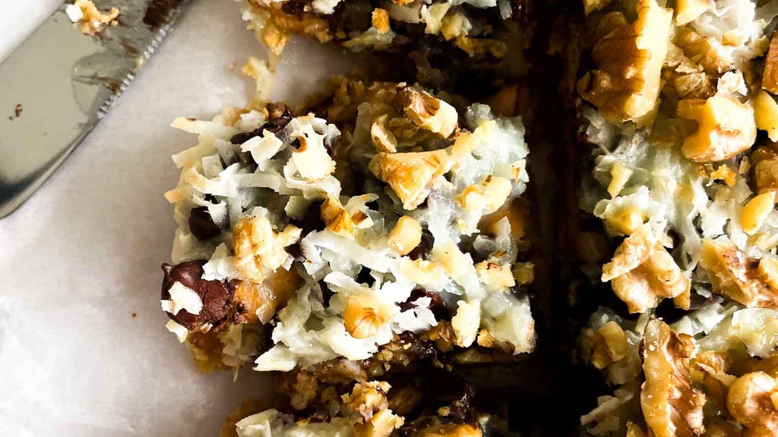 three slices of seven layer magic bars