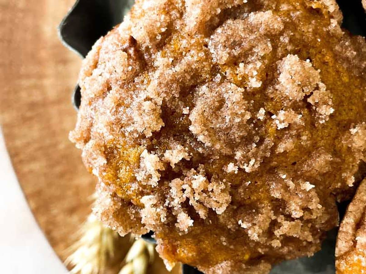 overhead view of starbucks copycat pumpkin cream cheese muffins showing cinnamon streusel topping