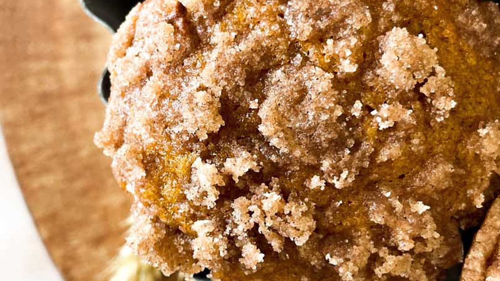 overhead view of starbucks copycat pumpkin cream cheese muffins showing cinnamon streusel topping